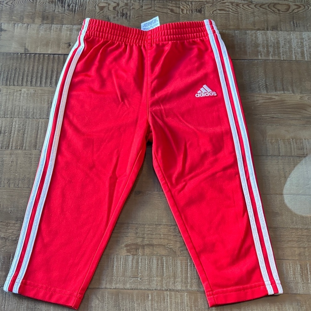 Adidas Kids Red Joggers with w White Stripes